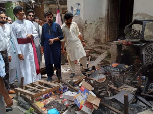 Pakistan Christians 2 - Bishop visits scene.png