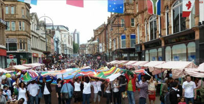 Hope Banner paraded through Briggate Leeds