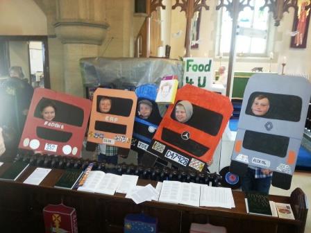 Children use drama and cardboard boxes to tell the story of the power of sharing for their harvest message eh s