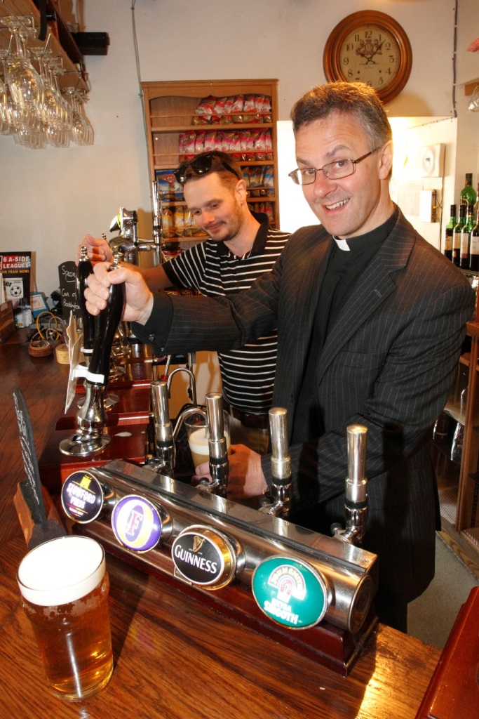 The Dean learns to pull a pint