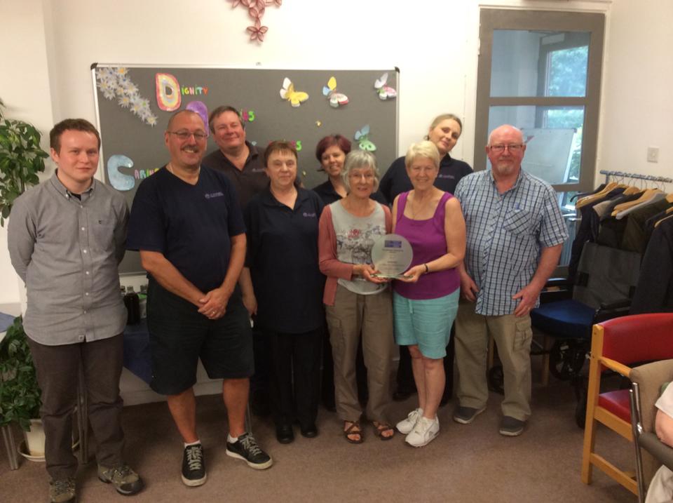 A group photograph of some of the volunteers who made the award possible