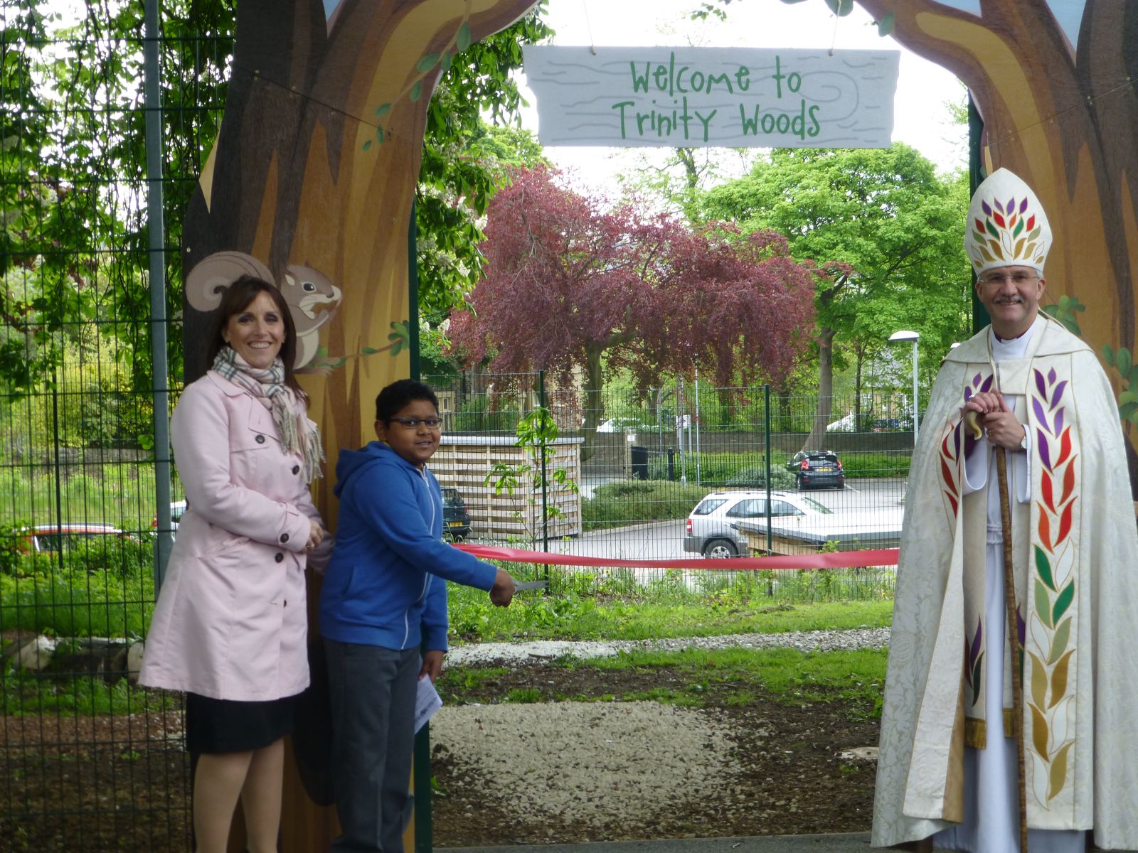 Trinity Woods being opened by Bishop Jonathan, a pupil at the school and Headteacher Mrs Whetham