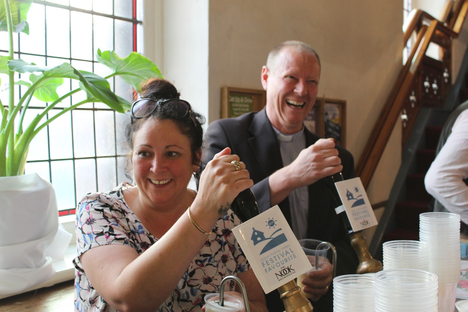 Jackie and Sean man the pumps for the Festival of Faith pints