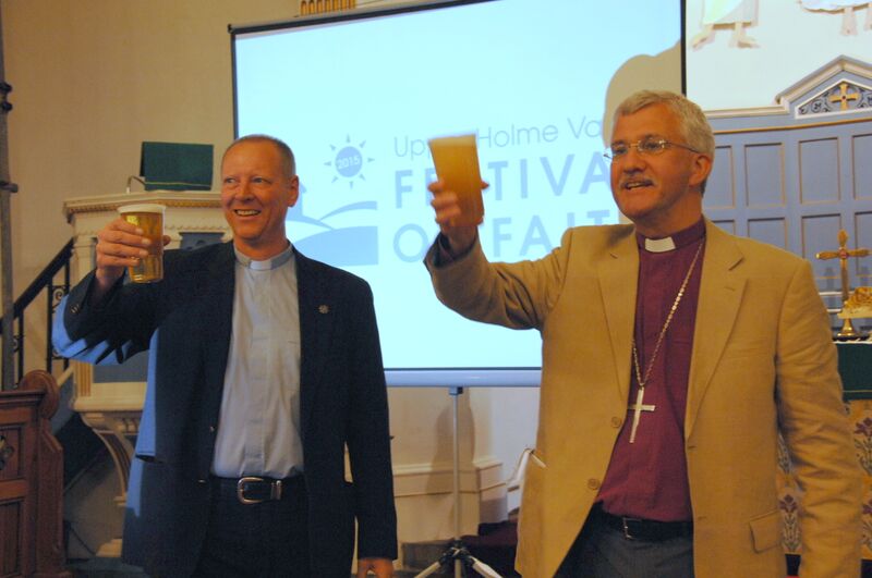 Revd Sean Robertshaw and Bishop of Huddersfield raise their Festival of Faith pints