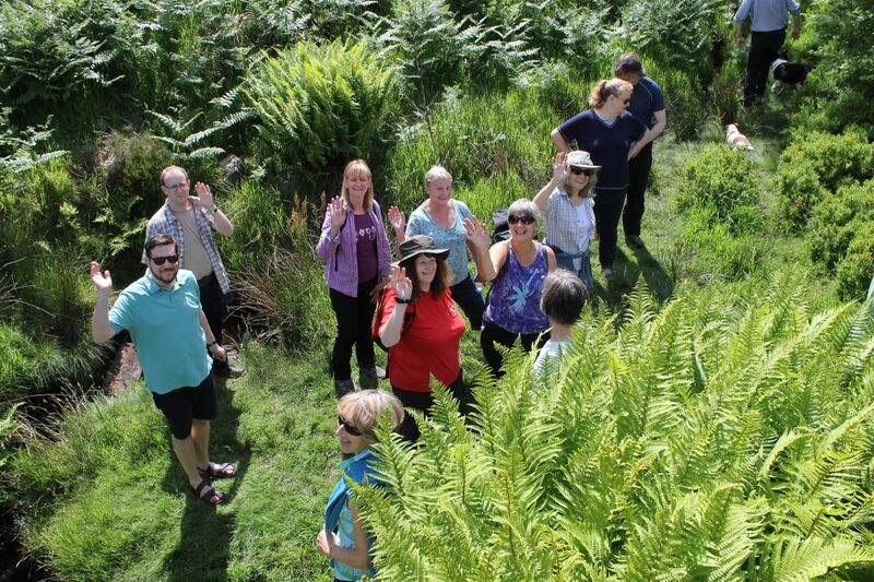 Walkers smiling and waving during God in the Great Outdoors