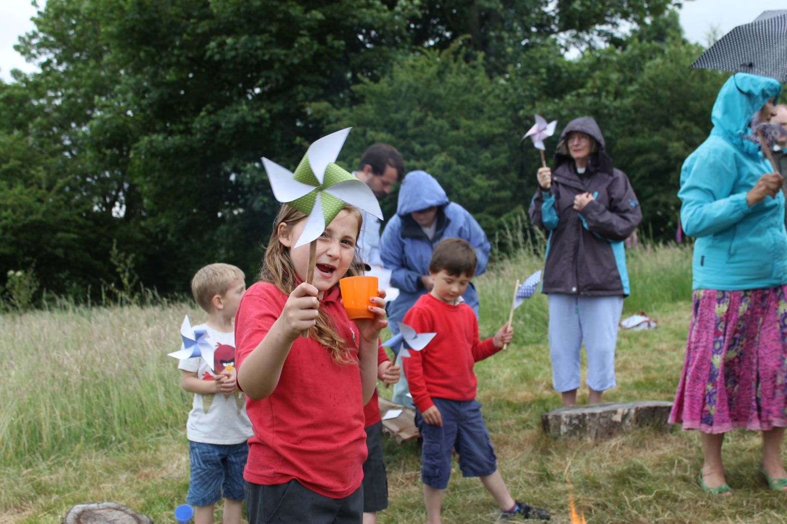 Children playing with their crafts from Get Up and Grow