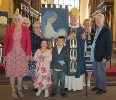 Christine Stedman, Rev John Chambers, Susan Scrafton, Bishop James, Ros Dobbins, Ann McDonald, Margaret Clayson, Lucy and Isaac with the new banner