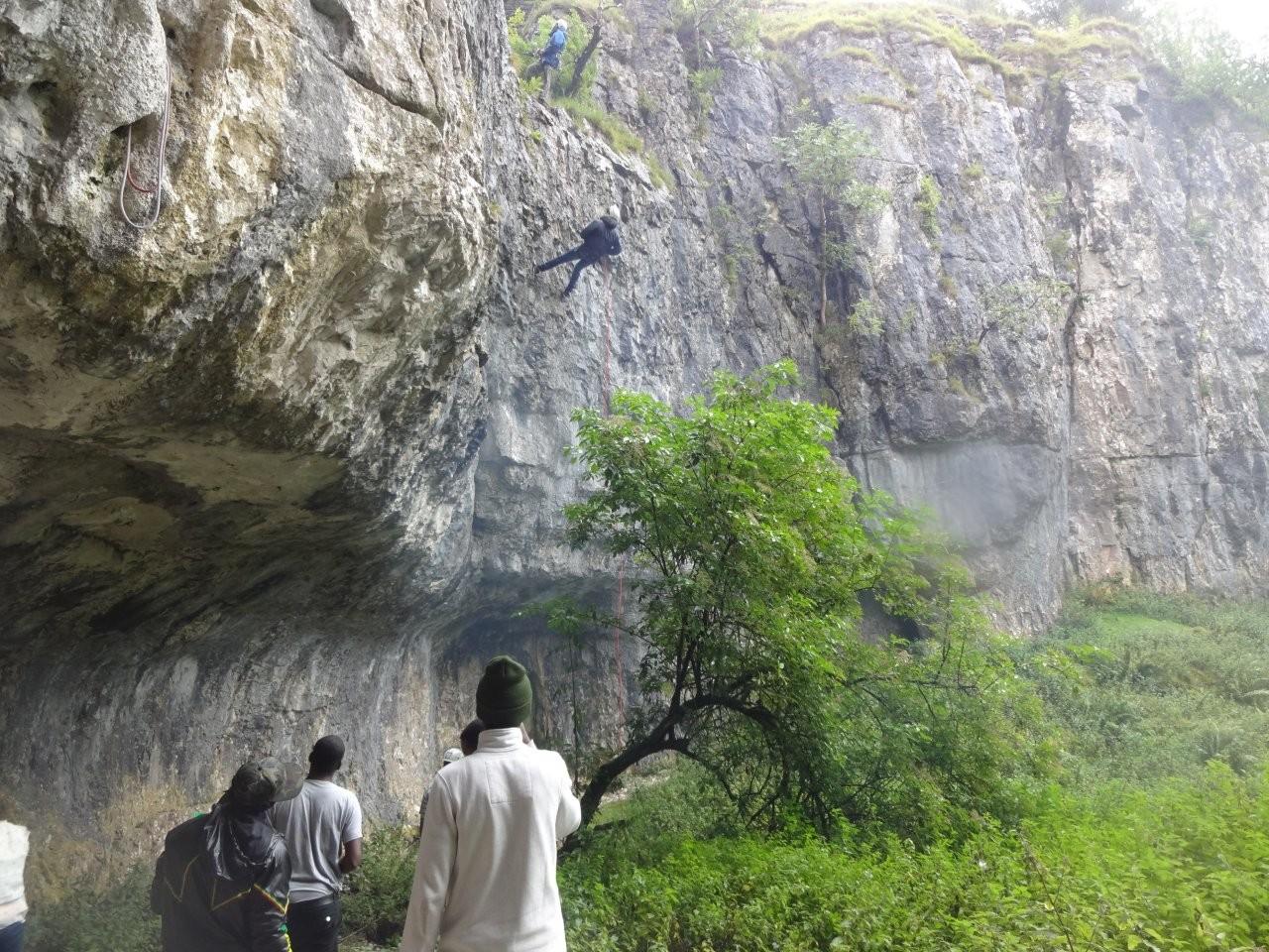 A group of the refugees abseiling