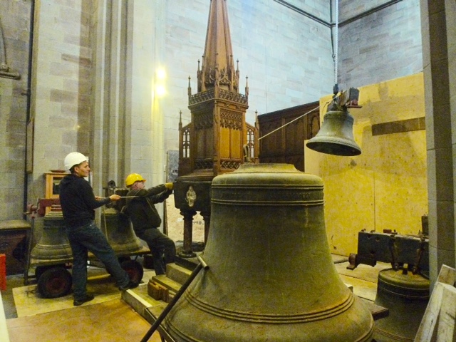 Bells beginning to be lowered into the church