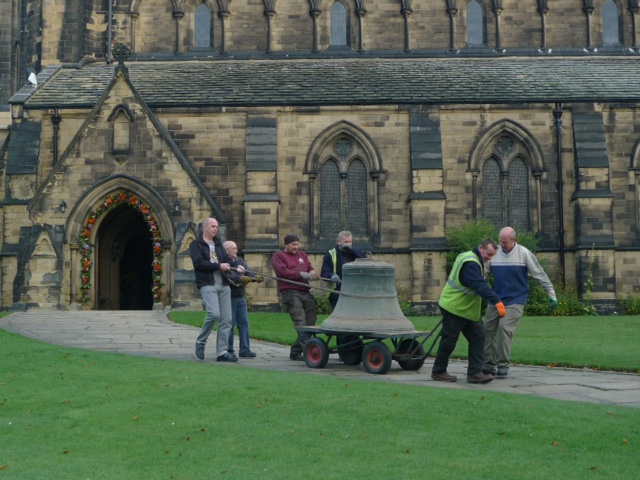 Bells being wheeled out of the church to get to the lorrey