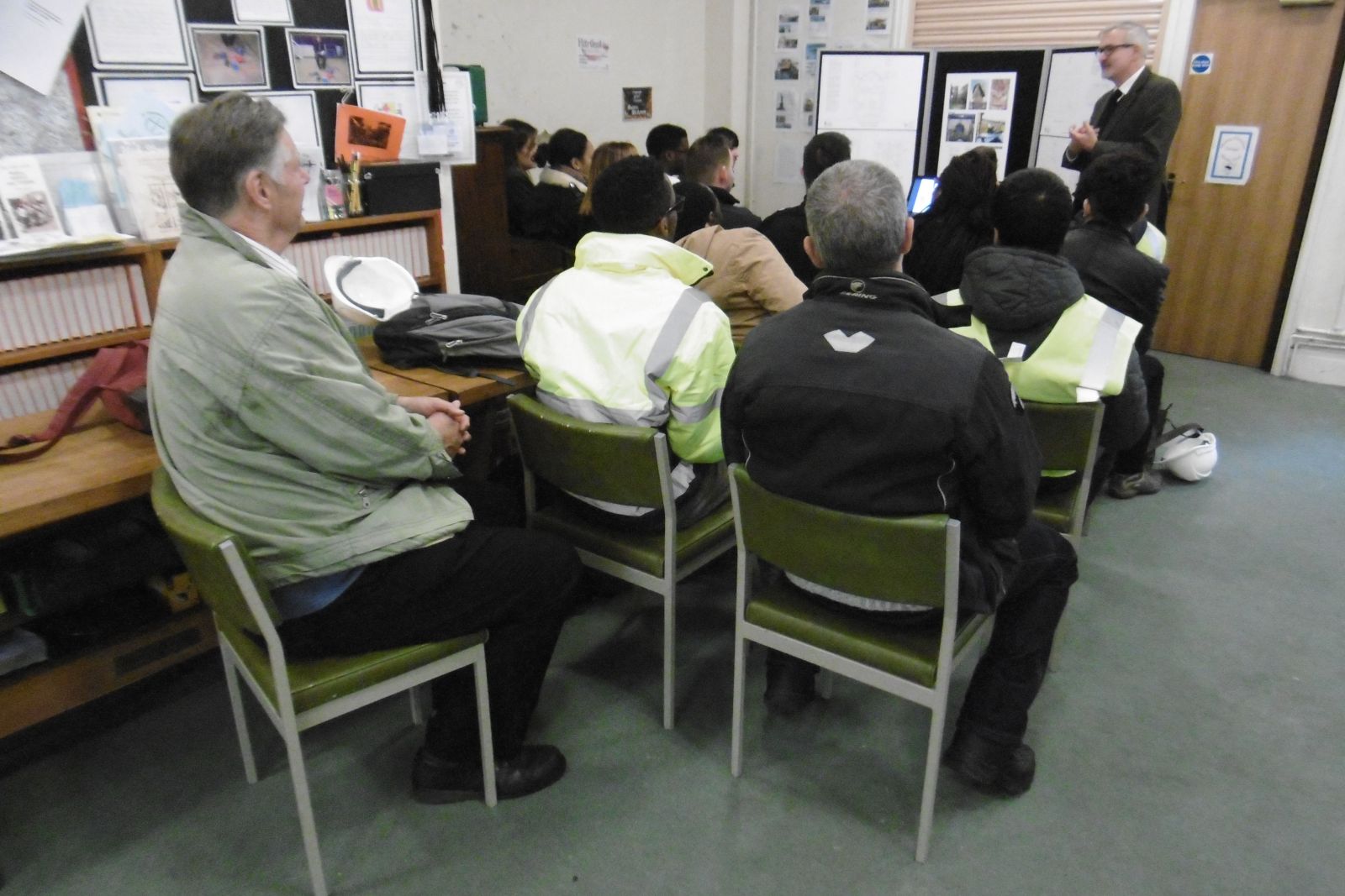 The students being given a talk at the church