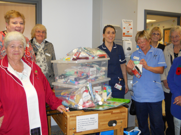 MU members giving packs to Pinderfields staff