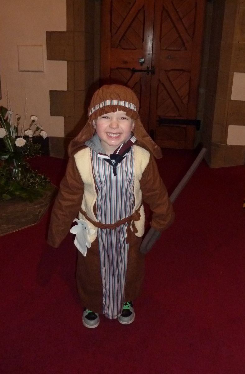 Little boy dressed as a shepherd