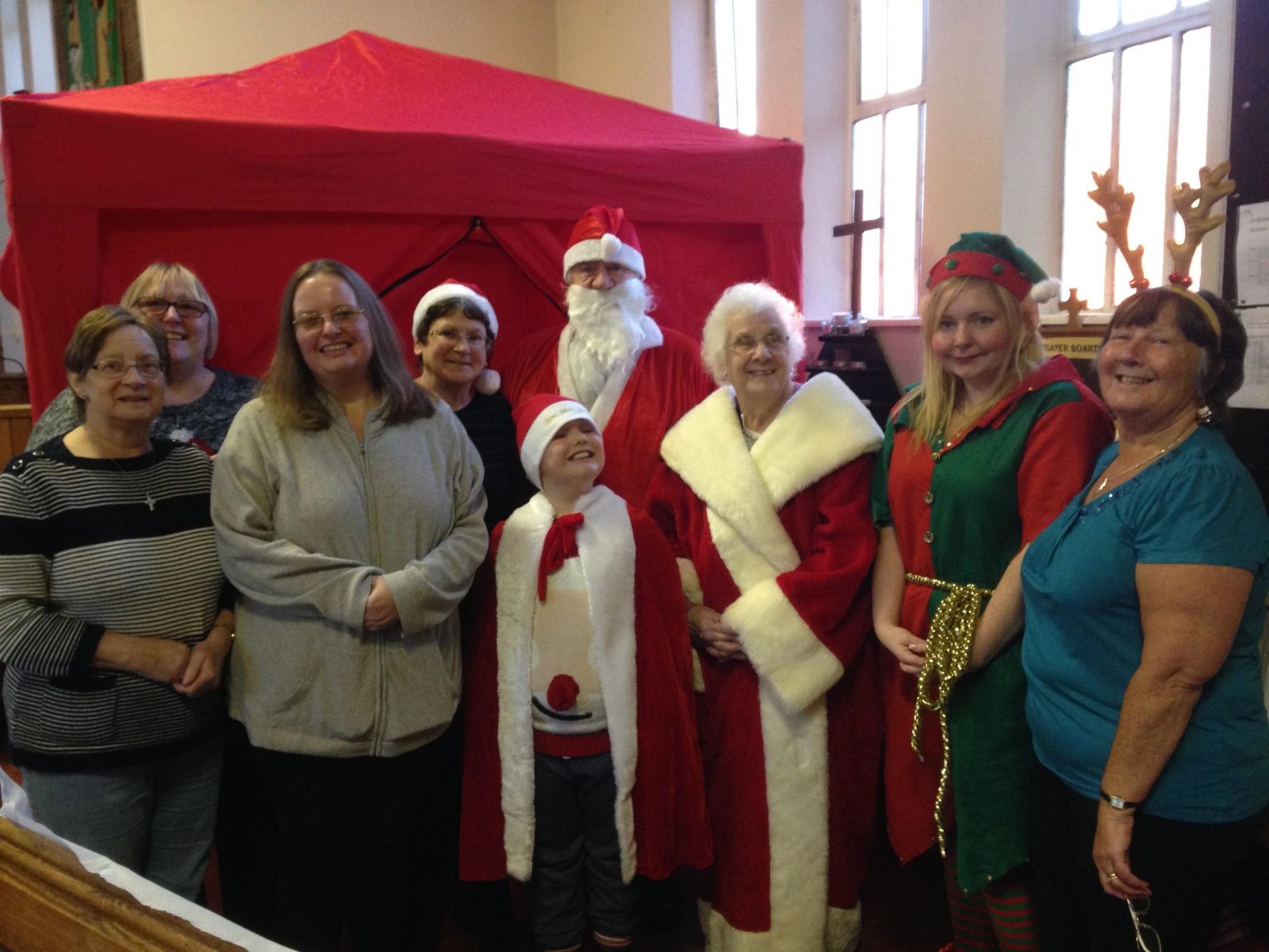 Mother and Father Christmas with a number of volunteers at the Christmas Fun event 