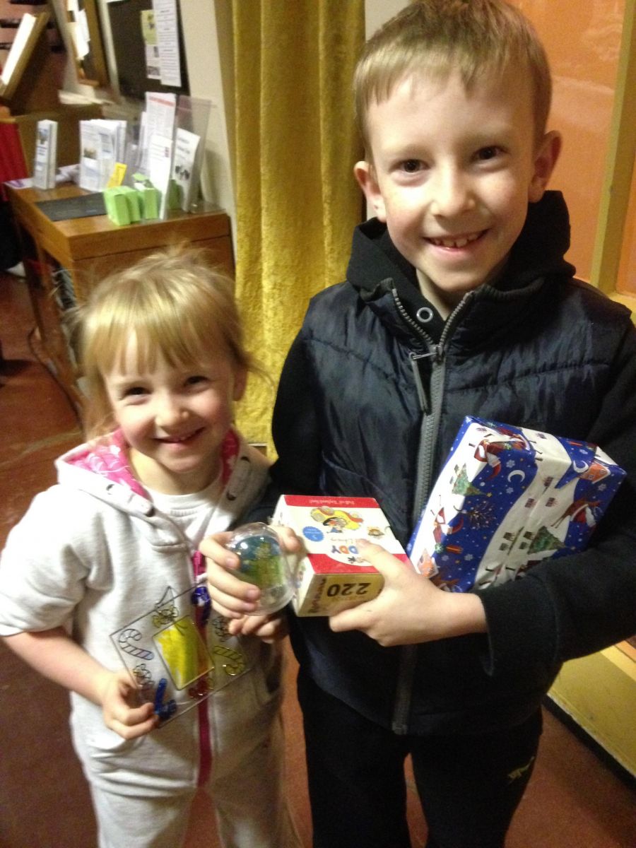 Two children with handmade decorations