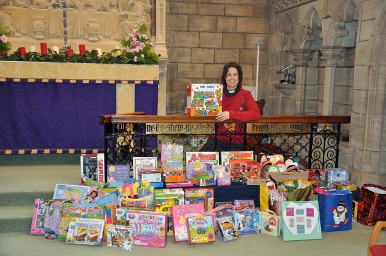 Revd Beverley Sproats with the toys collected