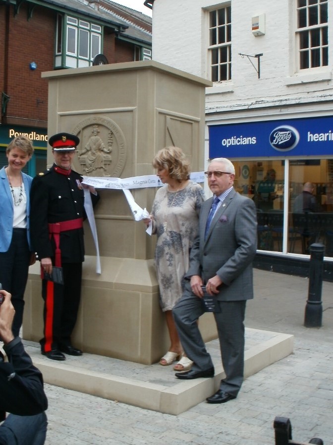 Yvette Cooper MP, Deputy Lord Lieutenant of West Yorkshire Michael Sayles Fox, Cllr Denise Jeffery and Paul Cartwright unveiling the monument.