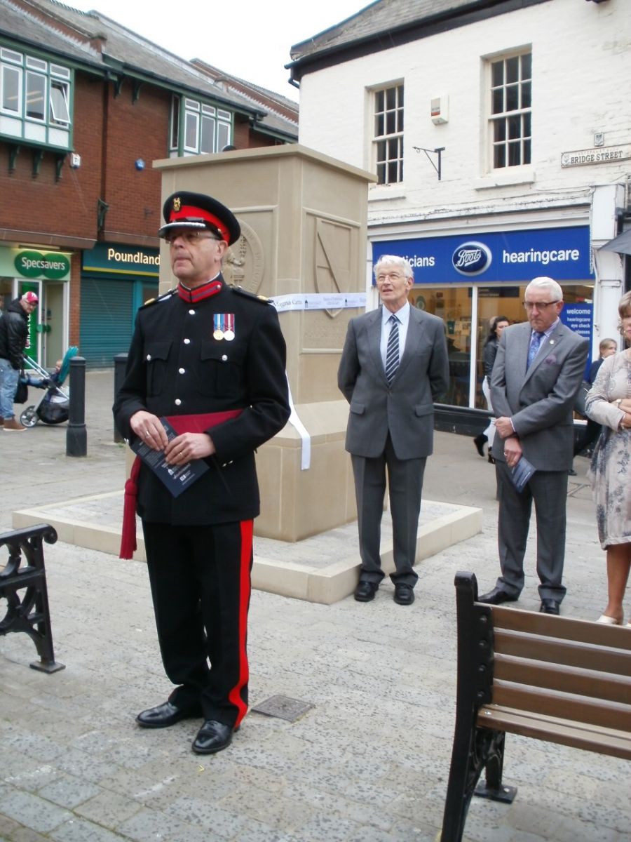 Deputy Lord Lieutenant of West Yorkshire Michael Sayles Fox speaking in front of the monument