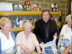 Bishop Tony helping at a foodbank